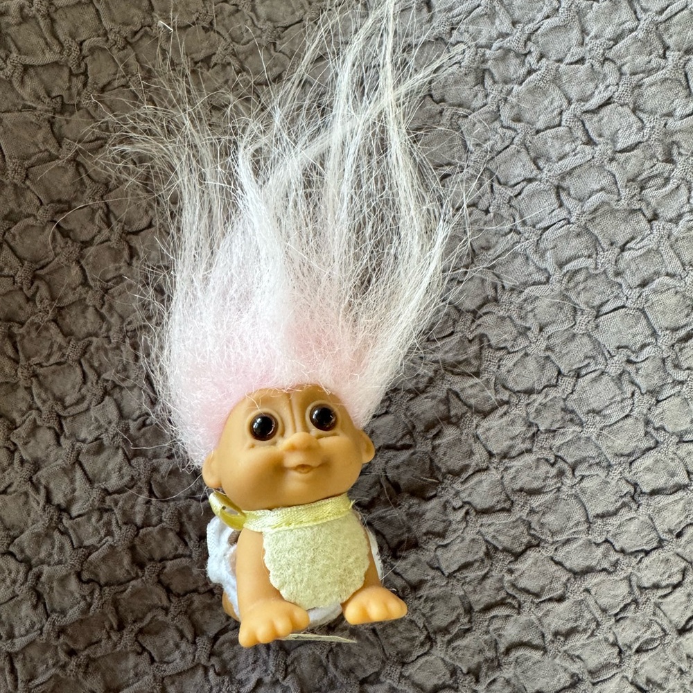 Vintage Russ baby Troll with pink Hair, brown eyes with diaper and bab
